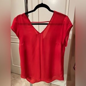 Silky orange top, easy to wash. Size M. Brand: DR2.